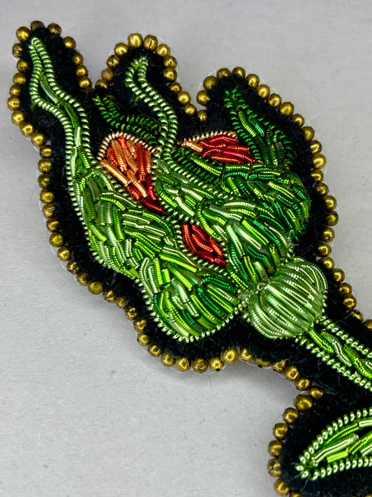Broche Bouton incandescent