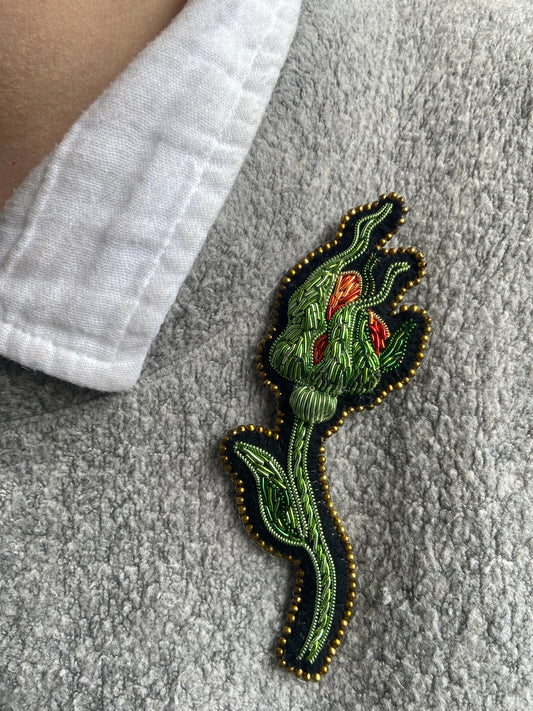 Broche Bouton incandescent